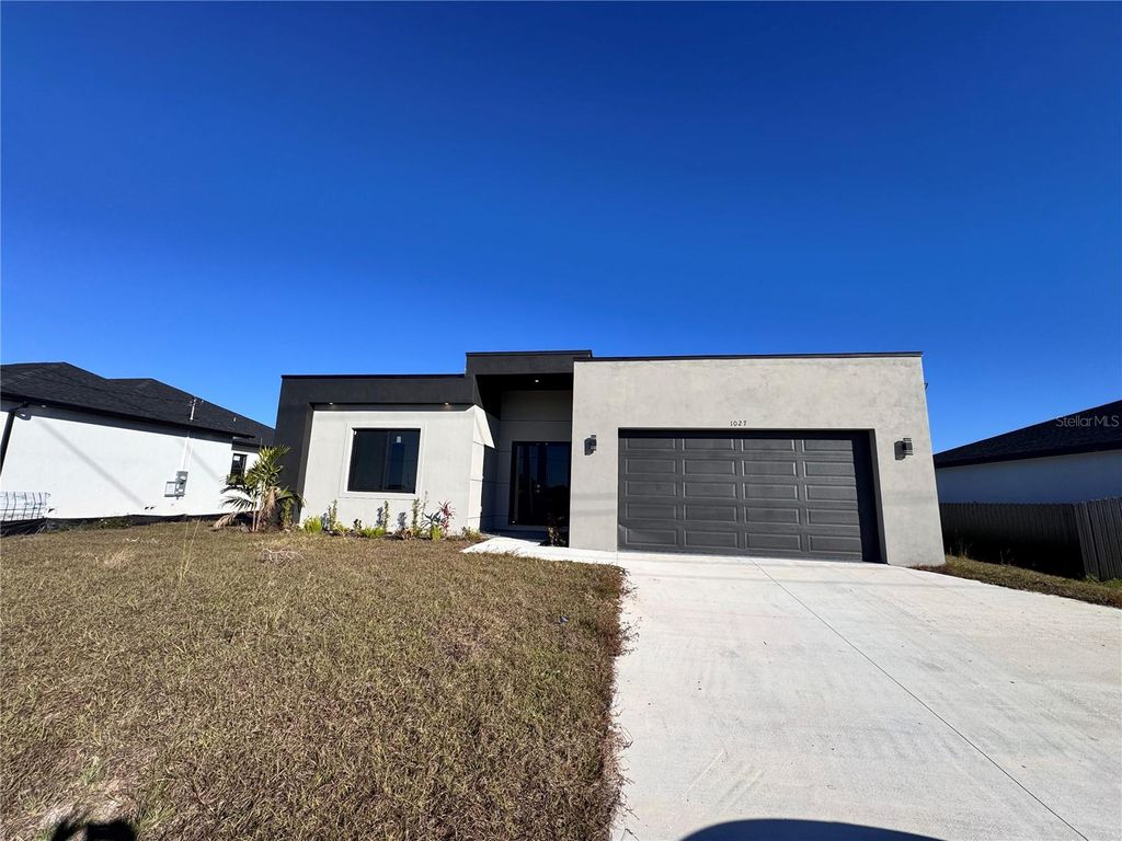 Photo of 1027 Kismet Parkway W, Cape Coral, FL 33993 (MLS # O6381430)