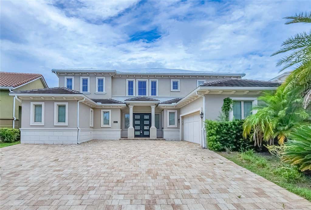 Photo of 11032 Mobberley Circle, Orlando, FL 32832 (MLS # TB8539228)