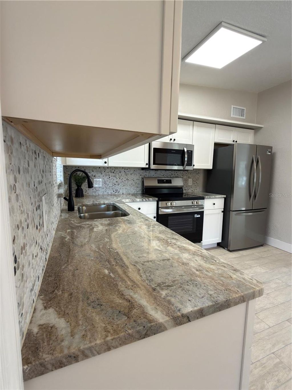 Photo of 2114 Catherine St, Kissimmee, FL 34741 (MLS # S5148543)