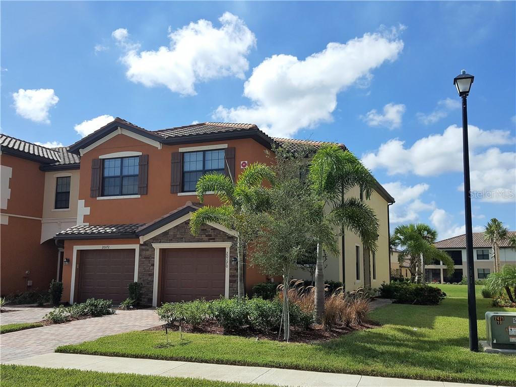 Great location in Gran Paradiso !! A spacious town home with three bedrooms, two and one half baths and an attached garage. All new, built in 2016. Full laundry on second floor for your convenience. Roomy living and dining areas in the great room. Large fully equipped kitchen. Screened lanai with a pond view. The community has a large and inviting clubhouse with many amenities like a dining room, game room, large heated pool , tennis courts and playground area. Don't miss this one. Internet included. Available for December, January and February season.
