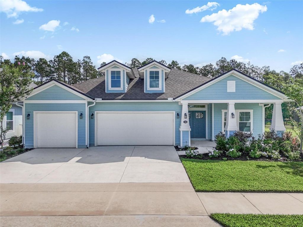 Photo of 124 Wood Stork Lane, Palm Coast, FL 32164 (MLS # FC318104)