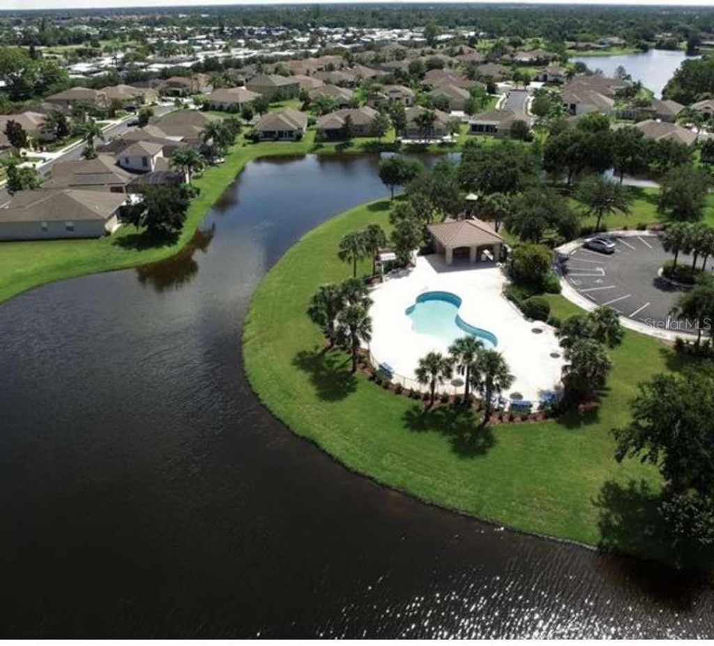 Photo of 24416 Lakeview Place, Port Charlotte, FL 33980 (MLS # TB8416209)