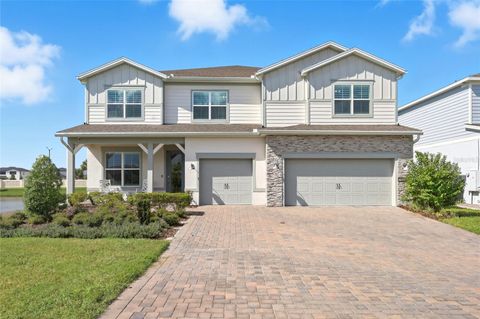 Photo of 13726 Tybee Beach Lane, Orlando, FL 32827 (MLS # O6345499)