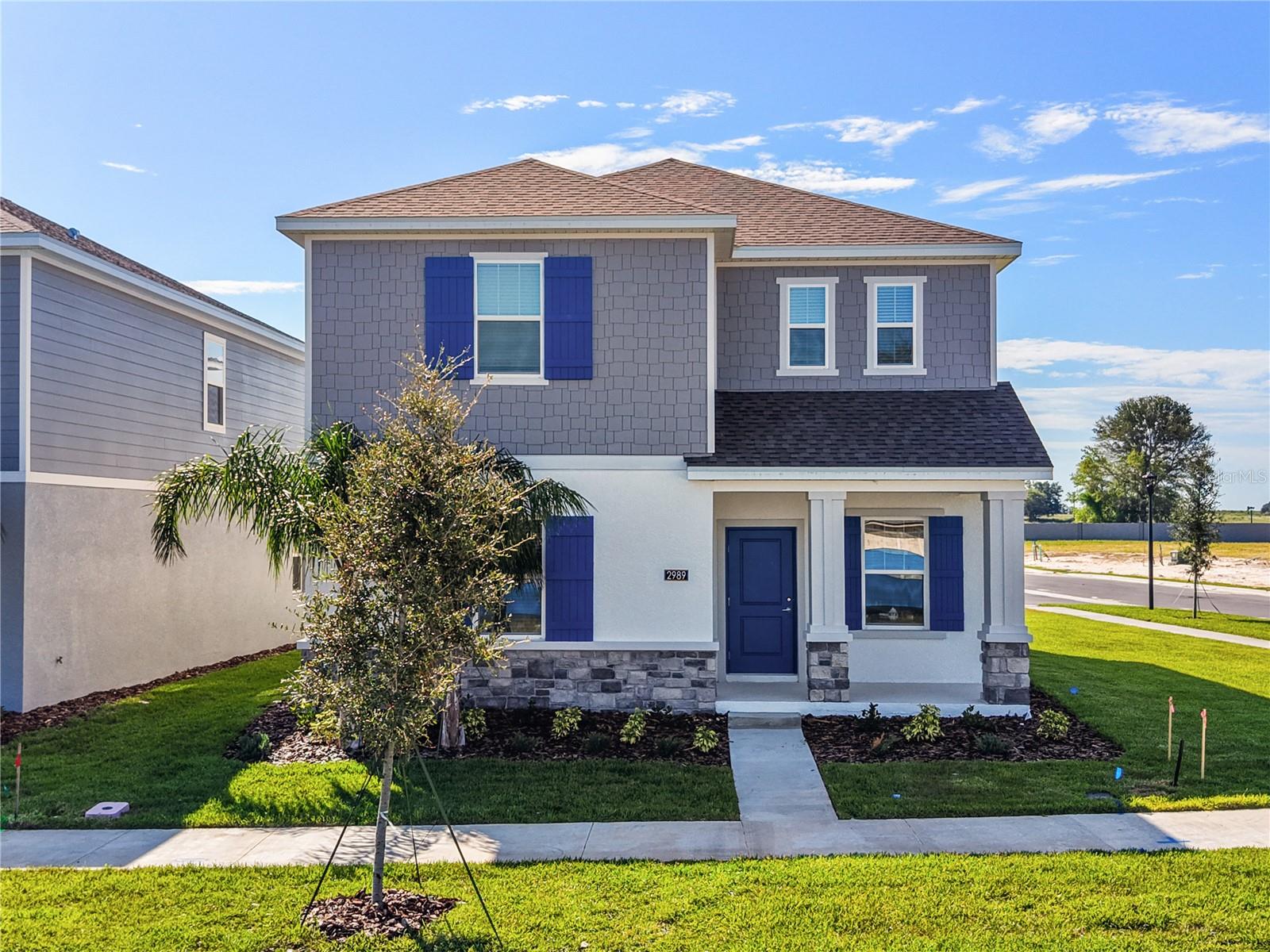 This is it! Your next address! Meet The Rio by Lennar, a brand-new, corner-lot home designed to adapt to just about any lifestyle. With having 6 bedrooms, this layout gives you the most flexibility for work, guests, or multigenerational living. Step inside, and you’ll notice the thoughtful design that blends open-concept living with formal spaces. The main level offers two bedrooms and a full bathroom, ideal for a home office setup, guest quarters, or a private suite for those needing main-floor living. The kitchen is the heart of the home, featuring sleek quartz countertops, all appliances included, and a seamless flow into the dining and great room. There’s also a formal dining space, perfect for hosting holiday dinners or special occasions. Upstairs, four additional bedrooms, including the spacious primary suite and a loft area to continue the entertainment upstairs. The primary retreat offers a roomy walk-in closet and a luxurious en-suite bathroom, creating the perfect place to recharge. Just 10–15 minutes from Clermont’s shopping, dining, and charming Saturday morning farmers markets, this home delivers both modern convenience and small-town charm. Don’t wait, schedule your tour today and see why this Rio checks every box.