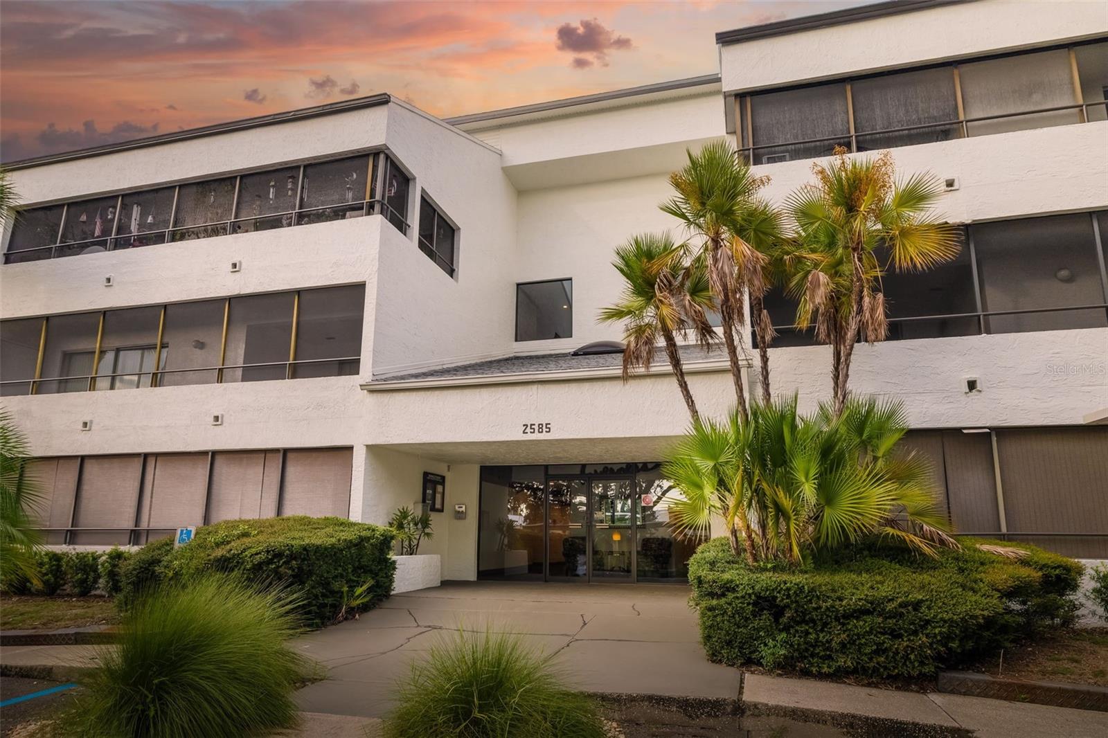 Incredible Clearwater location. Welcome to this beautifully updated top floor 3-bedroom, 2-bath corner unit offering 1,320 sq. ft. of living space in a secure elevator building. Every bedroom features sliding glass doors with direct access to a huge wraparound deck, perfect for relaxing or entertaining.
The primary suite includes a walk-in closet and a spacious bathroom, creating a true private retreat. The home also features a brand-new kitchen with modern cabinets, quartz countertops and appliances, plus the convenience of an in-unit washer and dryer hookup.
Additional highlights include a covered carport space, abundant natural light, and an open layout that enhances both comfort and style.
Located directly across from Westfield Countryside Mall, you’ll enjoy walkable access to shops, restaurants, and entertainment. This property combines comfort, convenience, and lifestyle in one ideal package. This is not a 55+ building.