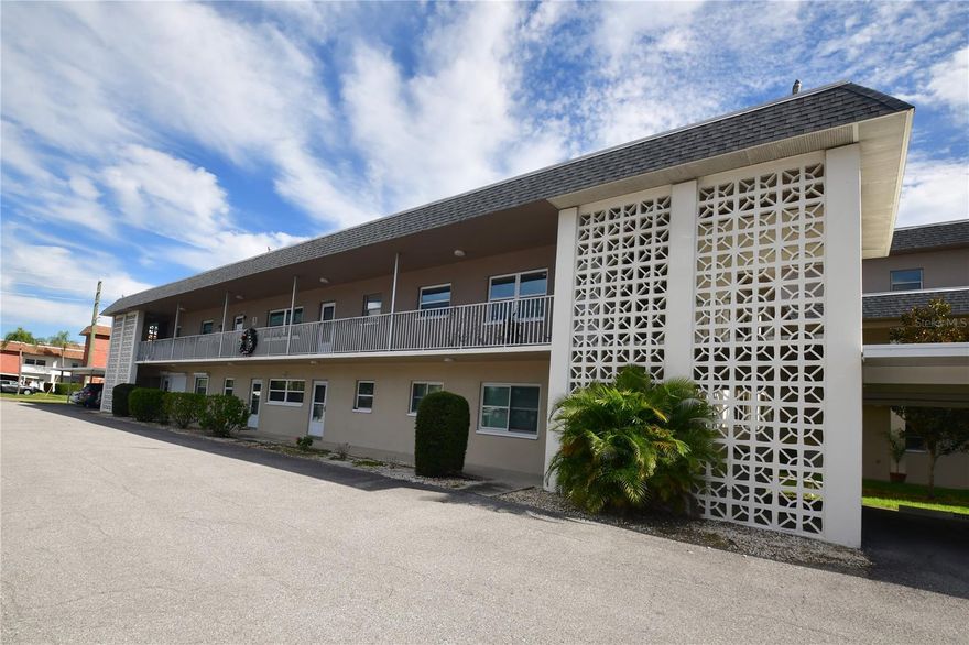 Charming 55+ Community Condo. Perfect for a weekend getaway, seasonal home, or primary residence. Spacious 2nd floor comfortable living. Spacious one-bedroom, one-bath with a walk-in closet, this home is thoughtfully designed for ease and style. The versatile bonus room, ideal as an additional bedroom, office, looks over beautiful  courtyard. Recent complete HVAC, Located centrally and complete assigned parking space  this pet-friendly property is offered fully furnished. Don’t miss your chance to own this exceptional property in a vibrant 55+ community. Inside washer.