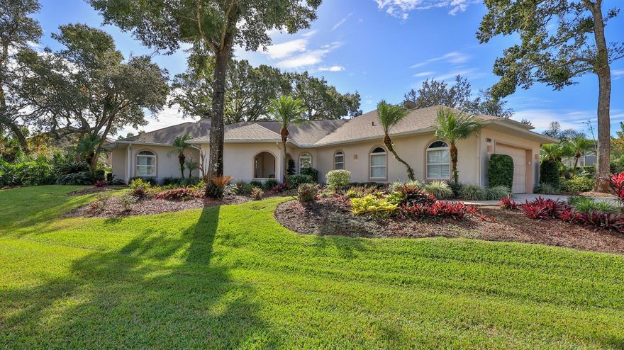 Live your dream in this appealing one-story home with an attached 48-by-40-foot hangar. Relish tiled social rooms, high ceilings, comfortable living areas, a convenient home office, plantation shutters, a gas fireplace, a covered patio and lanai, and a 2019 roof. The attractive kitchen with a lengthy breakfast bar has a center-island five-burner gas cooktop, granite countertops, plentiful cabinets and a pantry. French doors open to the fabulous primary retreat with a private den and a wonderful walk-in closet. Its en-suite bath has dual vanities, a soaking tub and a walk-in shower. With a split-bedroom floor plan, two bedrooms share a bath and a lounge with a kitchenette, a potential “in-law” suite. The air-conditioned hangar has a 48-by-18-foot bifold door, a storage loft and a 10-by-10-foot street side door. In 24-hour guard gated Spruce Creek Fly-In, the quality of lifestyle found in this friendly community is unmatched. Residents enjoy a multitude of amenities and activities, a playground and parks, and access to Spruce Creek waterway for fishing or to launch a canoe or kayak. Conveniently located, you can easily explore local shopping, dining and entertainment options with quick access to area beaches. In the community there is an on-site public restaurant, hair salon and other business services. The optional membership country club offers even more with tennis, pickleball, pool, golf, fitness facilities and a private restaurant. Featuring golf-cart friendly streets, patrolling security and on-site management, Spruce Creek Fly-In also has a private airport with a 4,000-by-176-foot paved runway, paved taxiways, a GPS approach, VASI lights and aviation services including fuel. You are minutes from Embry Riddle Aeronautical University, NASCAR headquarters and more. Most furniture and furnishings are available.