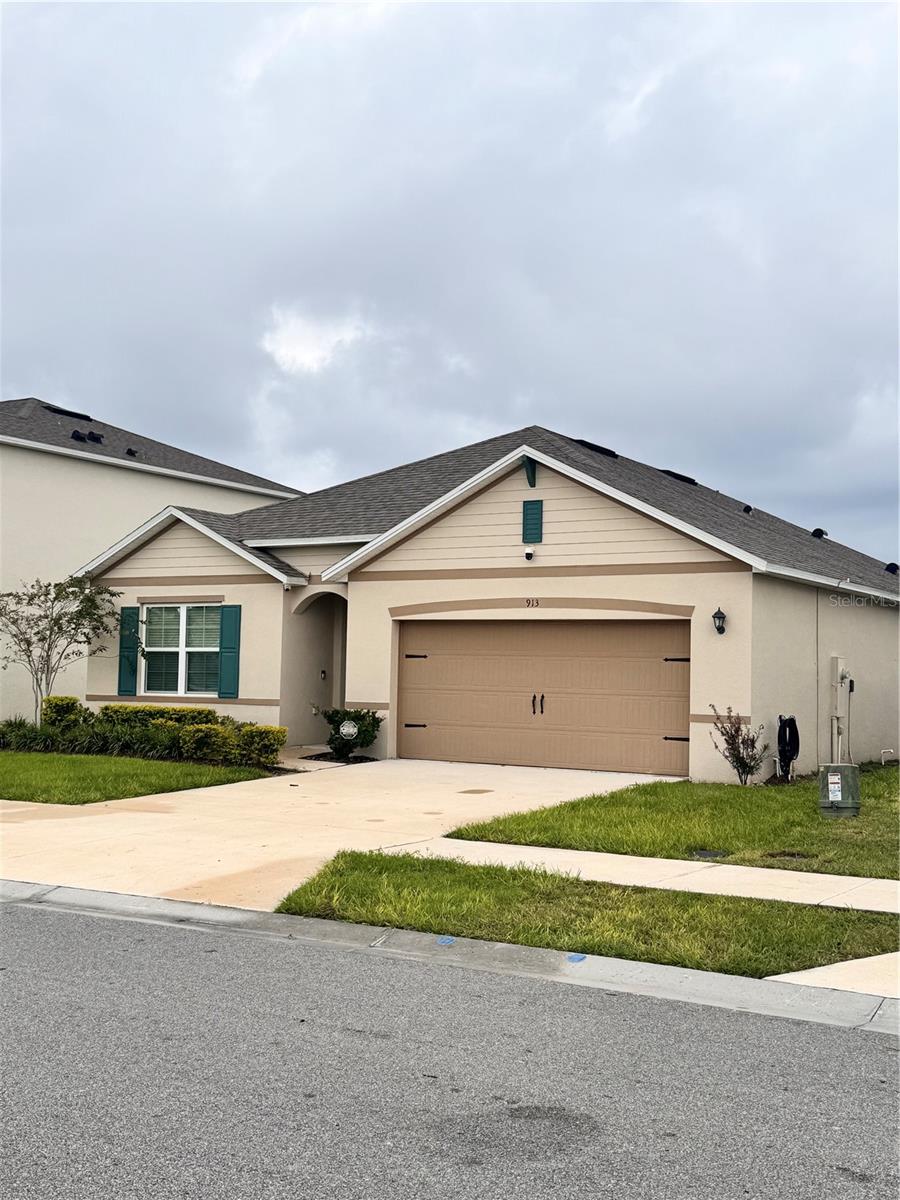 Photo of 913 Ambleside Drive, Haines City, FL 33844 (MLS # O6451125)