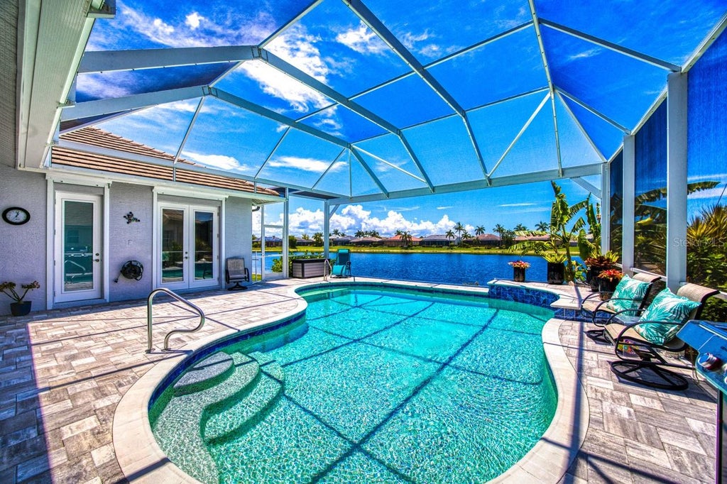 Photo of 8625 Southwind Bay Circle, Fort Myers, FL 33908 (MLS # C7532022)