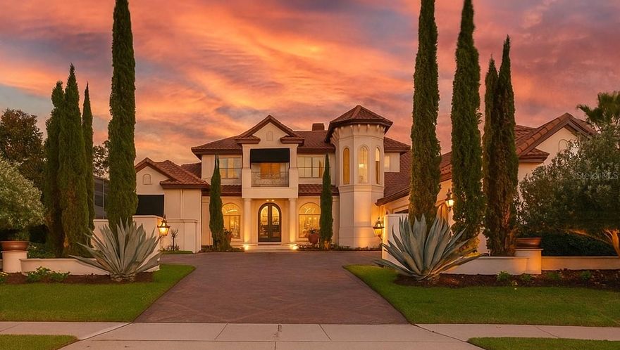 Experience the epitome of luxury in this exceptional custom-built Dave Brewer home, privately situated in the sought-after Enclave at Alaqua Lakes. Boasting over 7,000 square feet of living space, this stunning residence offers six bedrooms, six full baths, and two half baths - must be seen to be believed.  This property may be under audio/visual surveillance.