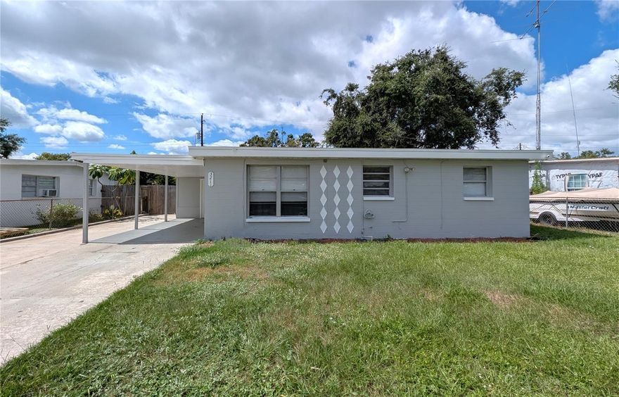 Charming 3 Bed / 1 Bath Home in Tampa! This lovely single-family home offers 792 sqft of comfortable living space and plenty of charm. The bright, centrally located kitchen features freshly painted cabinets and countertops, along with a brand-new top freezer refrigerator and coil top range—perfect for everyday cooking and entertaining. Enjoy a welcoming open floor plan that seamlessly connects the living room, dining area, and kitchen, making the space feel light and inviting. Durable ceramic tile flooring runs through the main living areas, while cozy new carpet adds warmth to the bedrooms. Step outside to a spacious yard, ideal for relaxing, playing, or hosting get-togethers. Additional highlights include a convenient carport, a newer water heater, a brand-new 2024 AC unit, and a roof replacement in 2017 for peace of mind. Located in a fantastic Tampa neighborhood, you’ll have quick and easy access to shopping, dining, and everything the area has to offer. Don’t miss your chance to see this wonderful home—schedule a visit today!