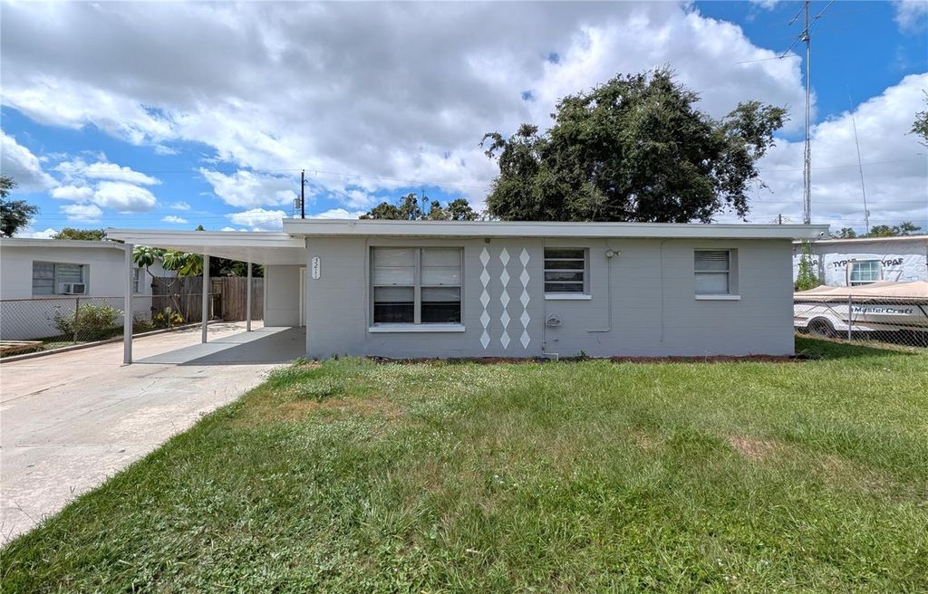Photo of 3211 Clifford Sample Drive, Tampa, FL 33619 (MLS # TB8434969)