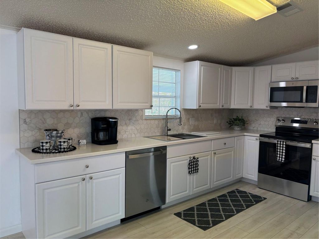 Photo of 1622 SW 35th Circle, Okeechobee, FL 34974 (MLS # OK225713)