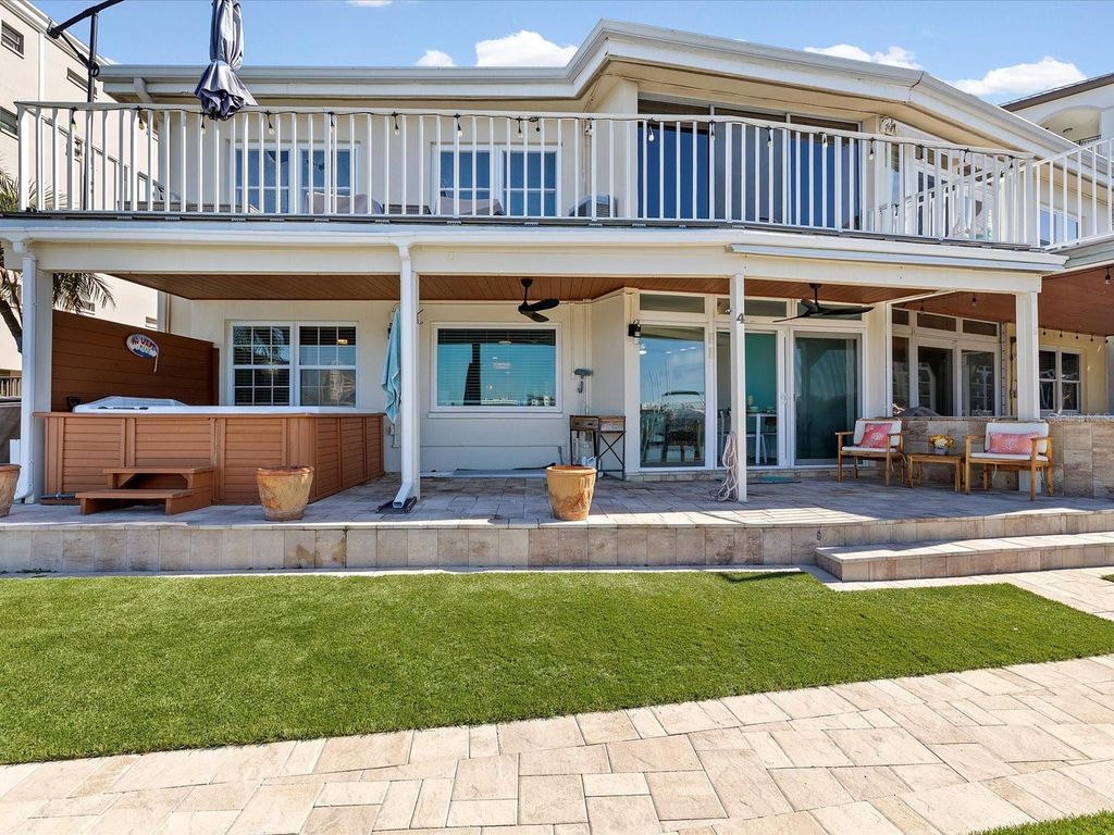 Photo of 205 Dolphin Point #4, Clearwater Beach, FL 33767 (MLS # TB8446838)