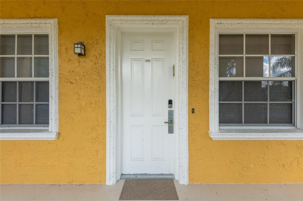 Photo of 6816 Dali Avenue #104, Land O Lakes, FL 34637 (MLS # TB8549438)