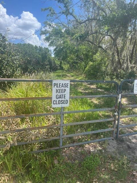 This 5.1-acre high and dry parcel offers an array of possibilities and is located just off Pleasant Hill Road in Kissimmee, FL. The region has experienced remarkable growth and development, with new master-planned communities cropping up nearby. Currently zoned agricultural (AC), the land may support diverse uses, including kennels and boarding facilities, nursery or greenhouse operations, livestock and grazing structures, storage of agricultural equipment, single-family residence, daycare center, bed and breakfast establishment and solar farm.