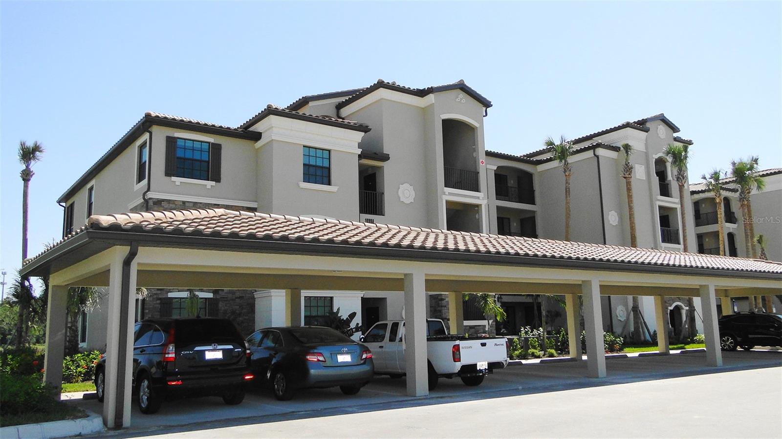 OPEN MARCH 2025 AND ON. DOGS FRIENDLY UNIT. Welcome to Lakewood Ranch, where luxury meets lifestyle in the prestigious Gated Resort Style & Golf Community of Lakewood National. Positioned on the ground floor, this corner condo offers breathtaking views of the serene lake and manicured golf course. Boasting 2 bedrooms, 2 bathrooms, and a versatile DEN, which can easily transform into an office, TV room, or third bedroom, this residence epitomizes comfort and functionality. The open floor plan seamlessly integrates the living, dining, kitchen, and lanai areas, creating an ideal space for entertaining guests or simply unwinding in style. Natural light floods the living room, and kitchen areas accentuated by additional windows unique to corner units. The kitchen features stainless steel appliances, granite countertops, a breakfast nook, and a bar area. Privacy is paramount with the master bedroom discreetly located at the rear, offering splendid views of the lake and golf course, along with two walk-in closets and a private bath with a huge counter and a walk-in shower. The second bedroom, situated on the opposite side of the unit, includes its own closet and access to the second bathroom right in front of the bedroom. A screened lanai provides a tranquil retreat overlooking the picturesque lake, with convenient access to the building's backyard area. Residents can enjoy one of the many heated pools just a short stroll away. Additional amenities include the laundry room inside the unit with washer, dryer, and storage, also, a storage unit outside the front door, designated carport, and ample open parking. Lakewood National presents a myriad of recreational opportunities, and the one-time membership transfer per unit of $642.00 gives you access to a challenging 36-hole Championship Arnold Palmer designed golf course, pickleball, tennis, bocce ball, and a clubhouse with a resort-style pool, fitness center, and so much more. Culinary delights await at the on-site dining options, including a five-star chef-led restaurant. Conveniently located in the heart of Lakewood Ranch, residents enjoy easy access to top-rated schools with Lakewood Ranch High school zone area, healthcare facilities, major highways, downtown Lakewood Ranch, UTC Mall in University Park nearby, short distance to I-75, SR 64, and the pristine beaches of Anna Maria Island, Siesta Key, Longboat Key and beyond. Whether you're seeking a TURNKEY FURNISHED SHORT TERM or ANNUAL rent this ground floor corner unit is a rare find in Lakewood National. Don't miss your chance to call it home. Dogs are allowed at the owner’s discretion with a pet fee. ANNUAL TURNKEY FURNISHED, SHORT TERM AT $3,000/ MONTH + EXPENSES. HIGH SEASON (JANUARY-APRIL) AT $6,000. Dogs are welcome here, so you don't have to leave your best friend behind.
RESERVED DECEMBER 2024 - FEBRUARY 2025. OPEN MARCH 2025 AND ON.. Welcome to paradise, WELCOME HOME!