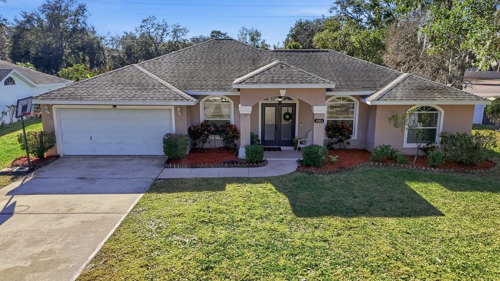 Photo of 6004 Sawgrass Point Drive, Port Orange, FL 32128 (MLS # V4946764)