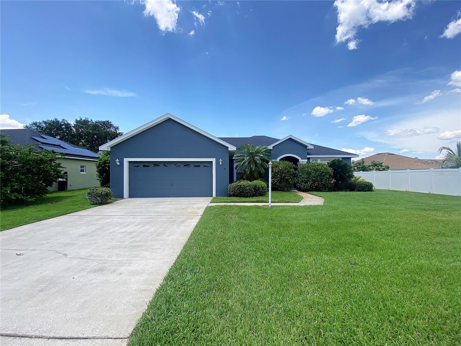Welcome to this beautifully maintained 4-bedroom, 2-bath home located in the desirable gated community of Terranova in Winter Haven. Boasting volume ceilings and a thoughtfully designed split-bedroom floor plan, this residence offers both space and functionality. The formal dining room provides a perfect setting for entertaining, while the fully equipped kitchen features a refrigerator, range, microwave, dishwasher, closet pantry, breakfast bar, and cozy breakfast nook. The oversized master suite offers a true retreat with a spacious bedroom, large walk-in closet, dual sinks, garden tub, separate shower, and private water closet. The guest bedrooms are well-appointed and share a full bath with a tub/shower combo. Enjoy the outdoors from the covered back porch with no rear neighbors for added privacy. Additional highlights include an indoor laundry room, fresh interior and exterior paint, brand new luxury vinyl plank flooring throughout, new upgraded lighting fixtures, and a private well for irrigation. Pets may be considered. Smoking and vaping are not permitted.