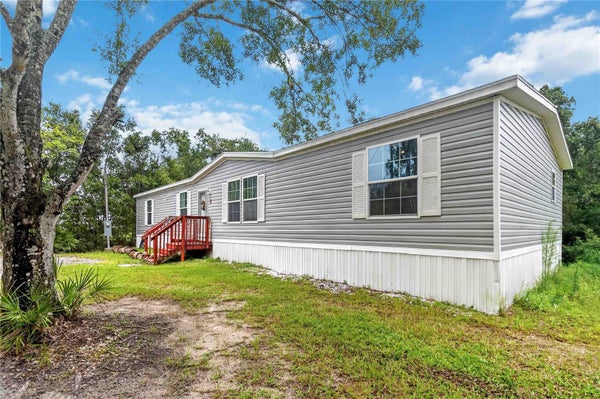 4235 PINE TREE DR, SAINT CLOUD, FL 34772 - Image d8b52a6477fe52cb4e18f6576df45b4b/948081793