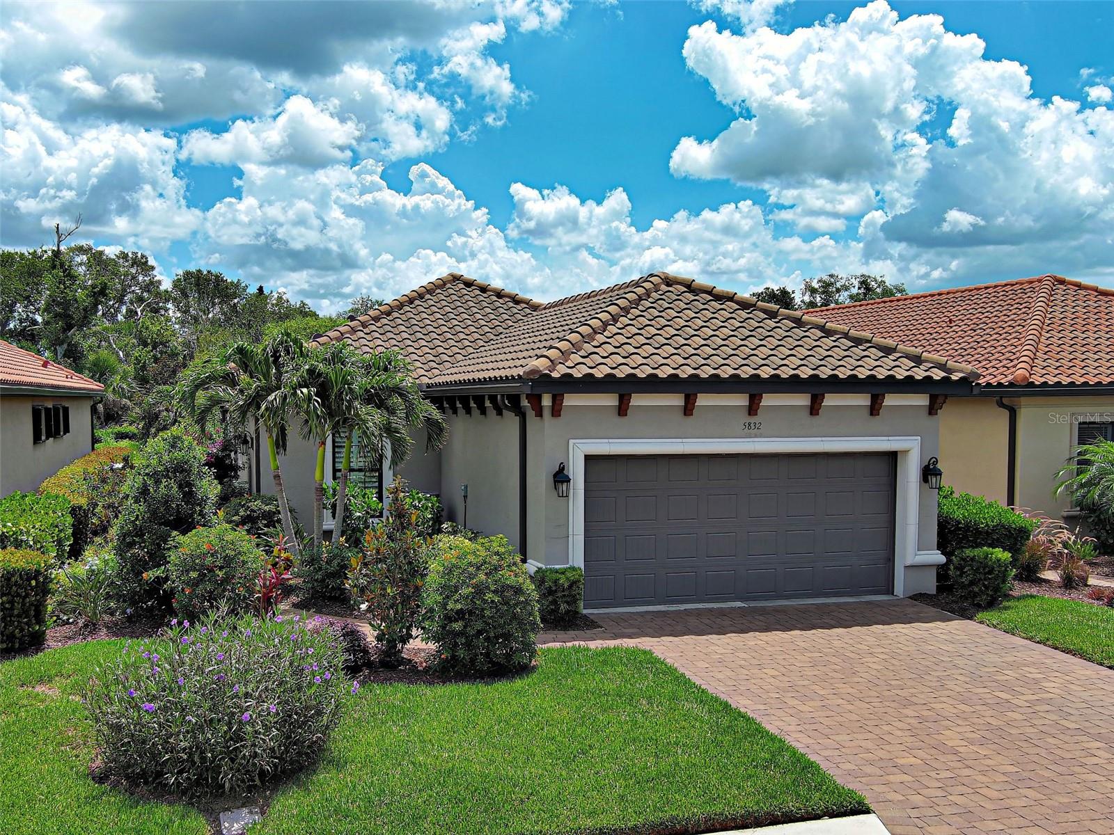 One or more photo(s) has been virtually staged. Immerse yourself in RESORT-STYLE LIVING at Bellacina by Casey Key! Welcome home to this stunning Taylor Morrison Roma model, built in 2020, featuring 1,678 sq ft, 2 bedrooms, 2 bathrooms, and a versatile DEN. Step out to your private tropical oasis, featuring a 400 sq ft HEATED SALTWATER POOL with a pebble tec surface, travertine tile patio and pool deck, and a WATER DECK with BUBBLER. Light up your night with color-combo pool/bubbler lighting — All pool equipment Wi-Fi enabled! The patio is prepared for you to install an outdoor kitchen, with plumbing and gas line already in place. For peace of mind, this home is equipped with HURRICANE SHUTTERS and remote-controlled KEVLAR HURRICANE SHADES for the lanai. You have exclusive access to the Legacy Trail right down the street! Bring your dog to frolic and play at the nearby designated bark park!
Step inside and you'll be delighted to find a split-bedroom floor plan, a spacious kitchen with all stainless steel appliances, quartz countertops throughout, recessed lighting, upgraded ceiling fans, crown molding, plantation shutters, a laundry room, a 2-car garage, and more! The primary bedroom features a bay window that overlooks the pool and lush landscape. The ensuite bathroom includes dual sinks, a walk-in closet, a seamless glass shower enclosure, and a rain showerhead.
Centrally located between Venice and Sarasota with quick access to I-75 and US 41, with Nokomis beach and the North Jetty, where manatee and dolphin sightings are frequent, just 3.5 miles from your door. Quaint and historic downtown Venice and Venice Beach are just 5.5 miles away!
This tight-knit, charming MAINTENANCE-FREE GATED COMMUNITY has a must-see amenity center! Offering complimentary and paid programs to include adult socials, potlucks, craft classes, card games, community holiday gatherings, BBQs, and much more. Amenities include a FITNESS CENTER, COMMUNITY POOL, SPA, GRILL, POOL TABLE, PICKLEBALL, BOCCE BALL, TENNIS COURTS, FIRE PIT, PLAYGROUND, WALKING AND BIKING TRAILS, COMMUNITY CENTER, AND GOLF CARTS ARE WELCOME!
You need to see this delightful home and community in person! Schedule your showing today!