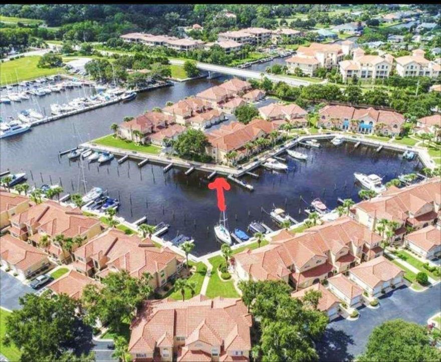 MILTON PROOF. NO DAMAGE TO ANY OF THE BOATS OR TO THE MARINA OR COMMUNITY. HARD TO FIND A MORE SECURE PLACE FOR YOUR BOAT In Florida. Large corner slip, the largest in Marina Cove just listed! Enjoy the freedom of boat ownership with this deeded boat slip at The Landings at Marina Cove. Even if you don't own a home in the community you can buy this boat slip. 52A accommodates boats up to 42 feet and offers a prime location just minutes from the Intracoastal Waterway (ICW). For added convenience, the Palm Coast Marina, located across the Grand Main Canal, provides easy access to fuel. Key Features: • PRIME LOCATION: Quick access to the ICW and nearby fueling at the Palm Coast Marina. • SECURE AND PRIVATE: Located in a gated community with a protected basin to shield your boat from the elements and storms. • AFFORDABLE FEES: Marina COA fees are only $405/quarter, covering gated security, water, two 30-amp power hookups, dock and seawall maintenance. • CONVENIENT AMENITIES: Includes a slip storage box and there is a pump out station. Please note, lifts and roofs over the docks are NOT permitted. JETDOCKS are permitted.