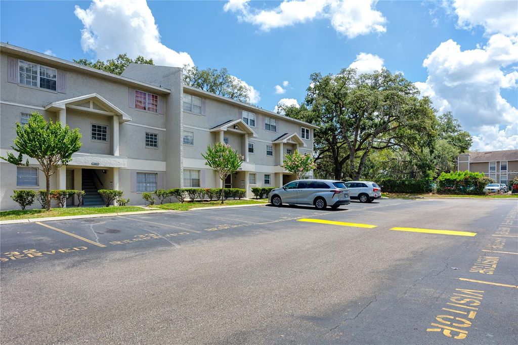 Photo of 14424 Reuter Strasse Circle #104, Tampa, FL 33613 (MLS # TB8525526)