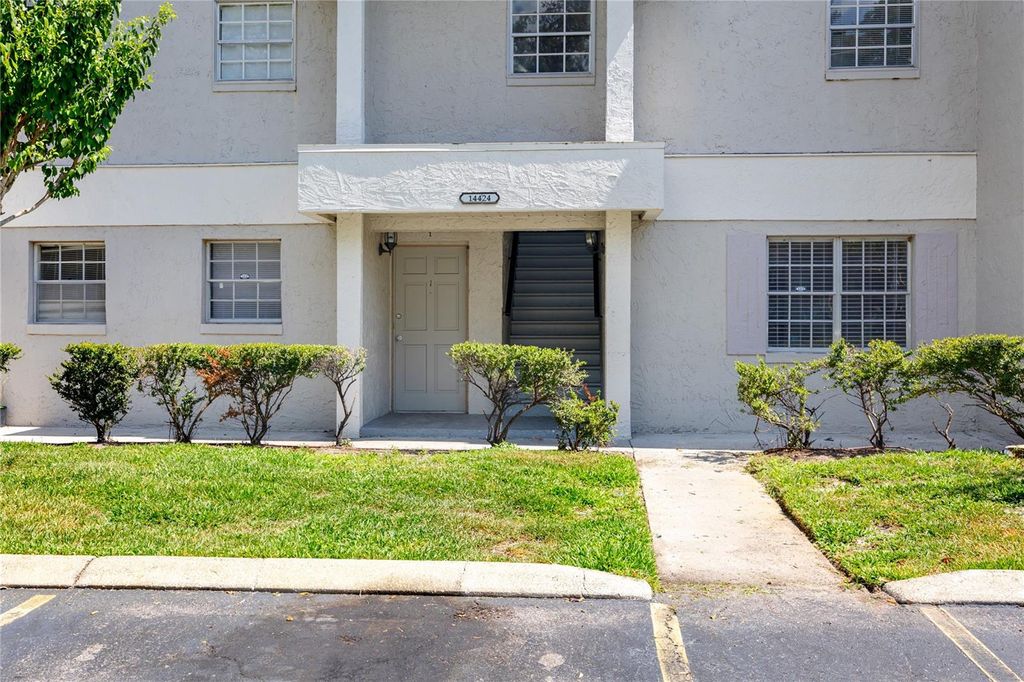 Photo of 14424 Reuter Strasse Circle #104, Tampa, FL 33613 (MLS # TB8525526)