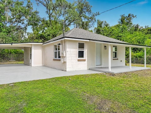 Photo of 7706 E 25th Avenue, Tampa, FL 33619 (MLS # OM733507)