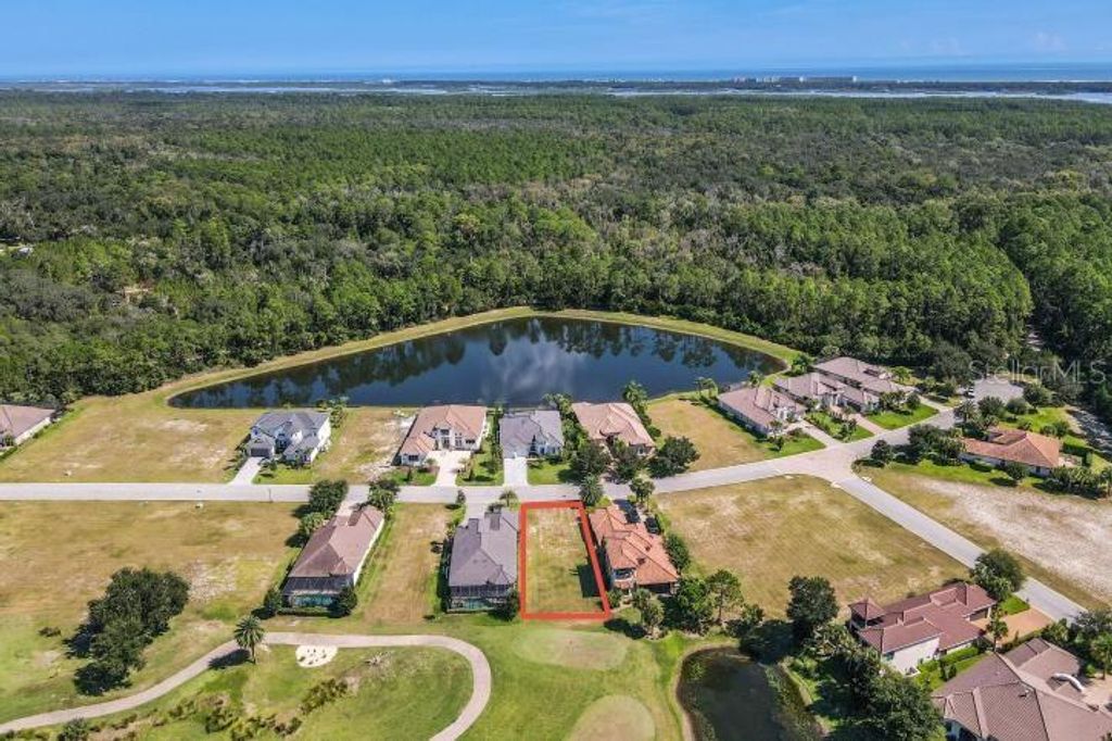 Photo of 195 Aspen Way, Palm Coast, FL 32137 (MLS # FC312965)