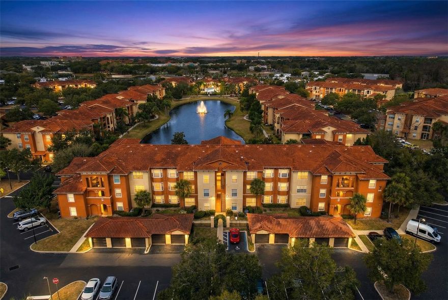 One or more photo(s) has been virtually staged. Welcome to resort-style living in the heart of MetroWest! This beautifully maintained 2-bedroom, 2-bath corner unit in the highly sought-after, 24-hour guard-gated community of The Palms Club offers comfort, privacy, and convenience all in one.

Located on the ground floor for easy access, this unit provides added privacy and peaceful surroundings. Enjoy your back porch overlooking picnic tables and lush green space, creating the perfect setting for relaxing outdoors. One of the bedrooms features a serene pond view, adding a tranquil touch to your everyday living.

Inside, the spacious and functional layout includes two generously sized bedrooms, each with large ensuite bathrooms. One bathroom features upgraded tile, and both bedrooms have brand-new carpeting. Major updates include a 2023 A/C system, brand new blinds for all the windows, 2019 hot water heater, 2017 washer, 2020 dryer, and a 2021 Refrigerator, offering added peace of mind.

The Palms Club is known for its impressive, resort-style amenities, including three swimming pools, a fitness center with aerobics studio, indoor bowling alley, racquetball court, sauna, tennis and sand volleyball courts, clubhouse, playground, and multiple picnic and BBQ areas—all set within beautifully maintained grounds.

Conveniently located just minutes from Valencia College, Universal Orlando, I-4, the Florida Turnpike, The Mall at Millenia, International Drive, Restaurant Row, and endless shopping and dining options, this home offers easy access to everything Central Florida has to offer.

Whether you’re searching for a primary residence or a great investment opportunity, this move-in-ready condo combines location, lifestyle, and value.