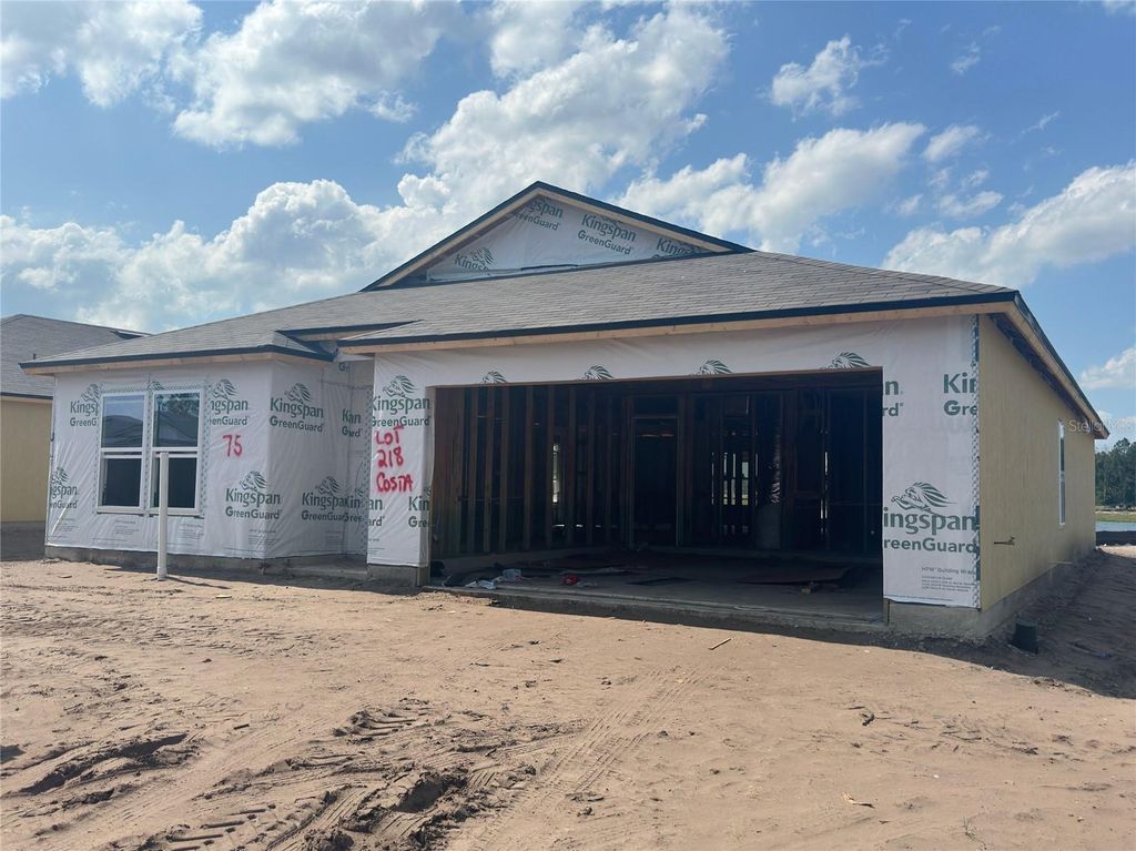 Photo of 75 Hulett Woods Road S, Palm Coast, FL 32137 (MLS # FC301380)