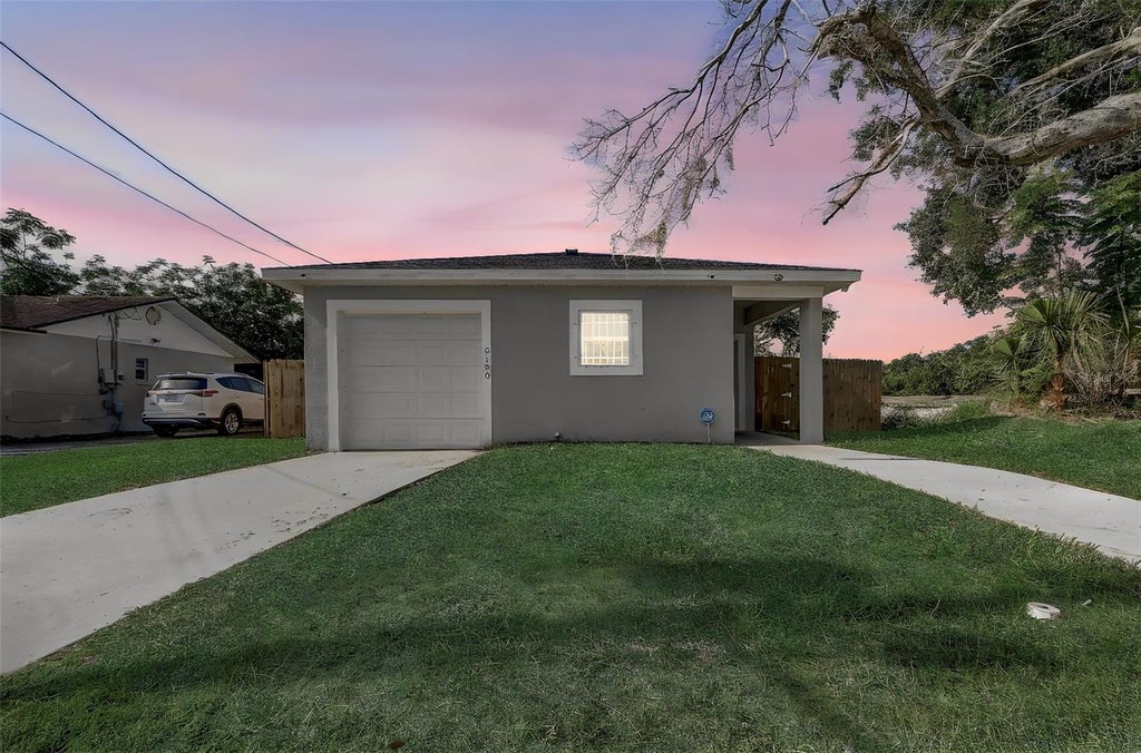 Photo of 6120 Denson Drive, Orlando, FL 32808 (MLS # O6416574)