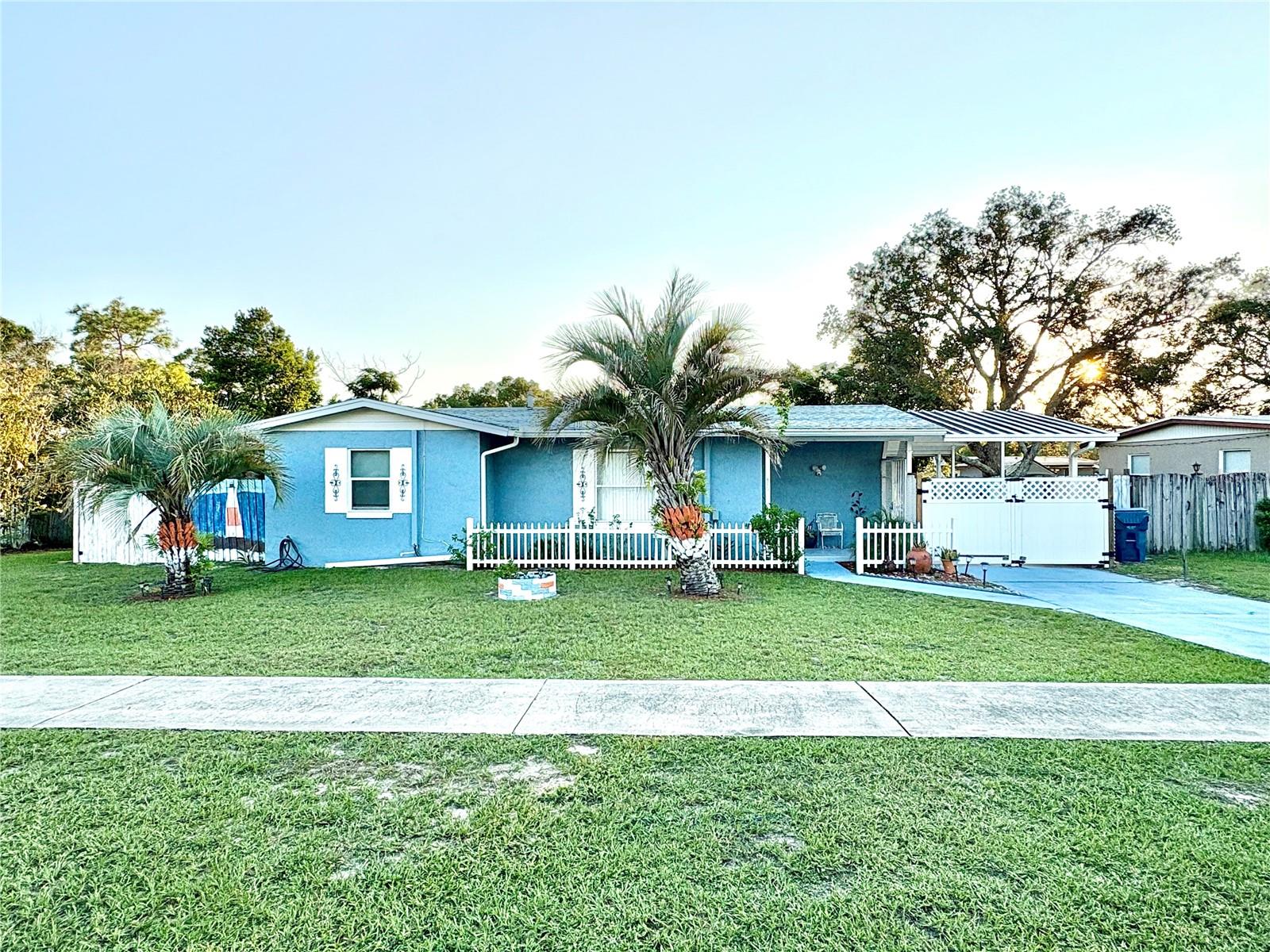 Step into the charming, well maintained 2 bedroom home - Easy Florida living at its finest! Discover the perfect blend of comfort and simplicity in this beautifully loved 2 bedroom, 1 bathroom home with over 1,300 total living square feet of thoughtfully designed living space. Nestled in a peaceful neighborhood, this quaint gem offers effortless maneuverability, making everyday living a breeze. Whether you're a first-time buyer, downsizing, or simply looking for low-maintenance charm, this home checks all the boxes. Move-in ready and full of character! Don't miss this rare find!