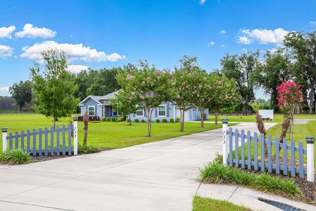Photo of 733 SW Marynik Drive, High Springs, FL 32643 (MLS # GC541293)