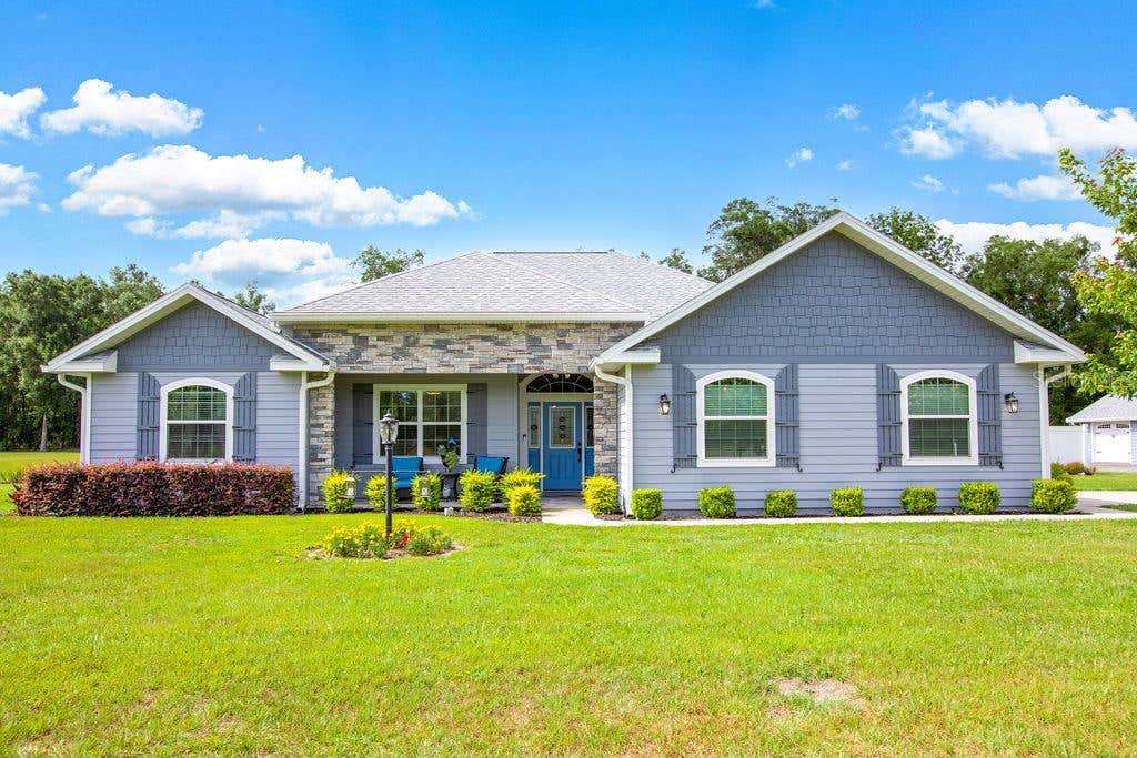 Photo of 733 SW Marynik Drive, High Springs, FL 32643 (MLS # GC541293)