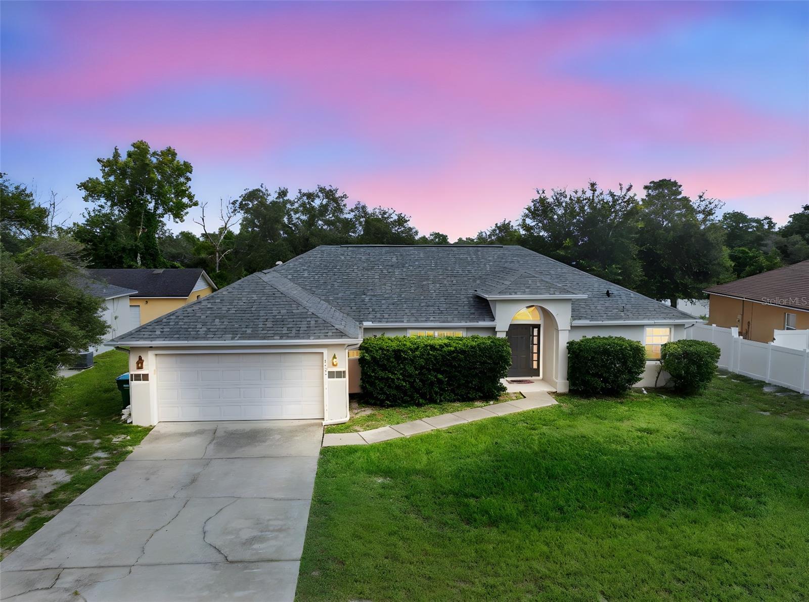 Welcome home in Deltona! This beautiful 3-bedroom, 2-bathroom residence offers the perfect blend of comfort, style, and practicality. Step inside and discover a beautifully designed open-concept living space, where the kitchen, family room, and dining areas seamlessly flow together, ensuring you're always part of the action. The heart of this home is its functional kitchen, boasting elegant stone countertops and rich wood cabinetry, providing ample storage and prep space for all your culinary adventures. The kitchen-family room combo is ideal for entertaining, allowing for effortless interaction with guests or keeping an eye on loved ones while preparing meals. Privacy is paramount with the split floor plan, strategically separating the master suite from the secondary bedrooms, offering a peaceful retreat for everyone. Convenience is key with an inside laundry room, making chores a breeze. Outside, you'll find a large backyard, perfect for outdoor activities, and a delightful screened Florida room, providing a serene space to relax and enjoy the Florida weather bug-free. Parking is never an issue with a double garage and a long driveway, offering plenty of space for vehicles and guests. Rest easy knowing this home is protected by a brand-new roof installed in 2024, providing peace of mind for years to come. This well-situated Deltona property is ready to welcome you home! Schedule your showing today!