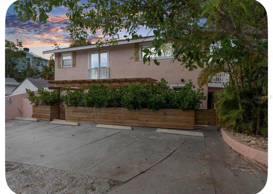 Located in the heart of highly sought-after Sunset Beach, this rare tri-plex opportunity is just a 2-minute walk to the beautiful white sands of Sunset beach and surrounded by the laid-back beach lifestyle that makes Treasure Island so special. Walk to local beachfront restaurants, live music, coffee shops, bars, and entertainment, while enjoying one of the most charming and walkable beach communities on Florida’s Gulf Coast. Previously operated as a highly successful short-term rental property, this unique beach compound consists of three separate units, including a main building with two apartments plus a detached standalone efficiency unit — offering endless possibilities for redevelopment, investment, vacation use, or future income potential. The property sustained flood damage during Hurricane Helene and wind damage during Hurricane Milton and is currently vacant and in disrepair. This is being marketed primarily for its exceptional location, lot value, and redevelopment potential. Renovate and reimagine the existing structures, elevate the property approximately 12 feet to create a future coastal retreat, or start fresh with brand-new construction. Opportunities like this in Sunset Beach are increasingly rare. This location places you minutes from everything beach living has to offer — waterfront dining, boating, fishing charters, dolphin cruises, parasailing, jet ski rentals, beach bars, live entertainment, and nightly sunsets over the Gulf. Whether you envision a luxury beach getaway, income-producing investment property, or a completely new coastal development project, the potential here is truly unmatched. Bring your vision and take advantage of this incredible opportunity to create something special in one of Tampa Bay’s most beloved beach communities. Photos of the exterior were taken prior to the hurricanes.