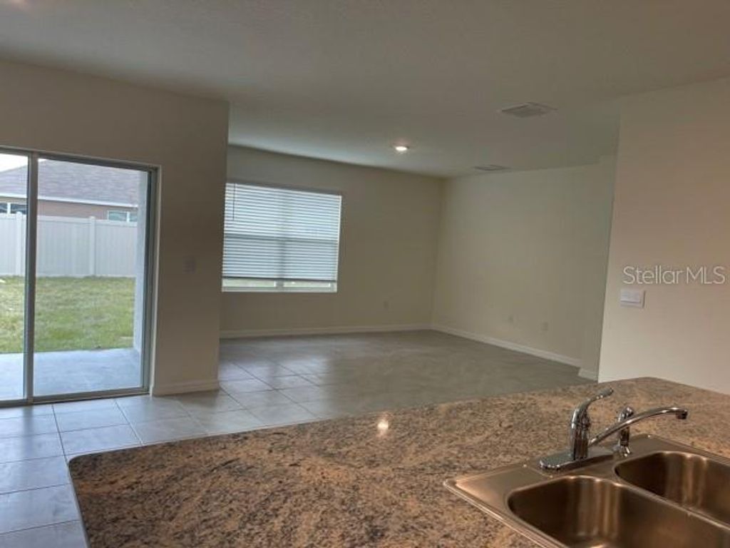 Photo of 5715 Margate Mill Bend, Wesley Chapel, FL 33545 (MLS # TB8492865)