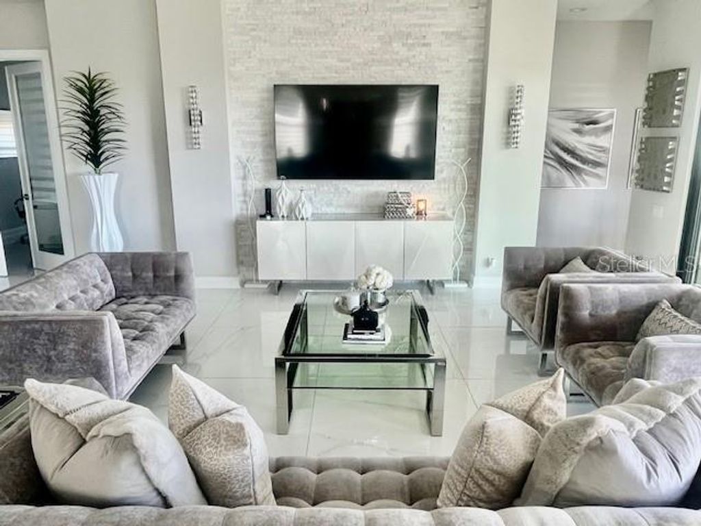 Photo of 360 Caladium Avenue, Lake Alfred, FL 33850 (MLS # O6384054)