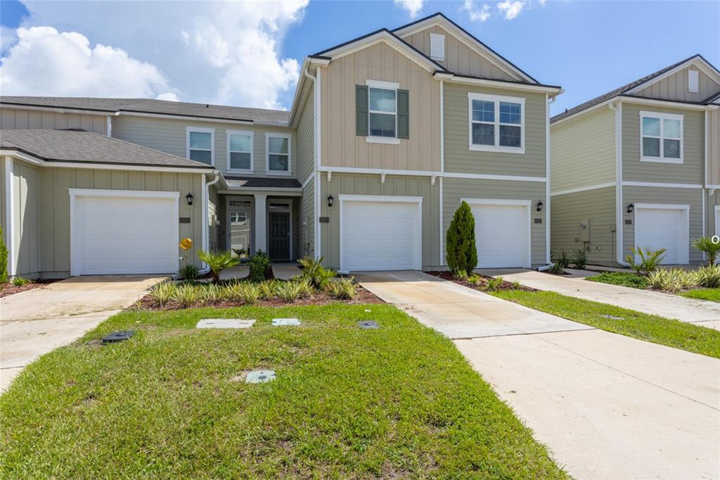 Photo of 71 Redbud Road, Palm Coast, FL 32137 (MLS # FC312198)