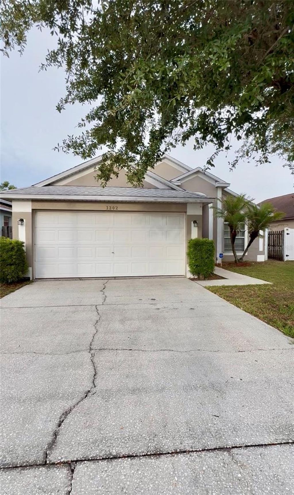 Photo of 1302 Belvoir Drive, Davenport, FL 33837 (MLS # O6417966)