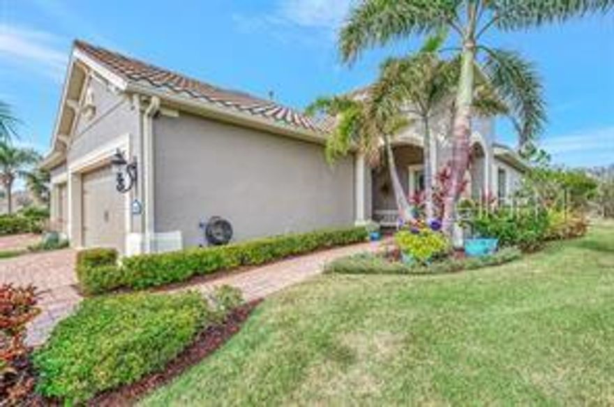 One or more photo(s) has been virtually staged. Why wait to build or go through Warranty when this updated Villa is ready to move in with countless upgrades!  Nestled in the sought-after Grand Palm community, this meticulously kept Villa has 2 BDRM, 2 BA with Study/Den that can also be used for additional guests that adds comfort and functionality in a serene resort-style setting!  Inside you will find modern upgrades including a new shower and vanity countertops in the guest bathroom, improved shower design in the primary bathroom, custom privacy accordion shades for both the guest and primary bathroom suites, Rev-A-Shelf cabinet organizers in the kitchen and primary bathroom, custom kitchen pantry, upgraded kitchen appliances, vented microwave range hood, enlarged kitchen island with new countertop, plantation shutters, new A/C in 2018, new water heater in 2024, hurricane shutters for the entire villa, custom privacy accordion lanai shade and so much more!  Enjoy your quiet peaceful evenings on the extended lanai with an added paver patio while enjoying the tranquil backyard with a preserve setting on a larger lot.  This section of Grand Palm has their own community pool, hot tub and outdoor BBQ grill available only to residents living within.  Grand Palm is an amenity-rich community with an abundance of activities to keep you busy with 26+ miles of walking/biking paths, tennis, pickleball, a fitness center, three additional community pools, splash pad, dog parks and a full-time Activity Coordinator.  Just a short drive to beautiful Gulf Beaches, Historic Downtown Venice, vibrant Wellen Park, the Atlanta Braves Stadium and easy access to I-75.  Living the life you have earned can be more than just a dream, so schedule your private showing today!