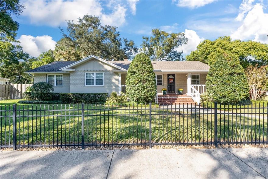 This home is a true South Tampa treasure offering both historical charm and new updates throughout. The spacious 4-bedroom 3.5 bath home is located in the heart of Palma Ceia, sitting on an oversized 109 x 100 fully fenced lot in the exceptional, A-rated Roosevelt/Coleman/Plant school district. Upon entry via the inviting front porch (who doesn’t love a porch swing?) a warm and cozy Formal Living Room leads to a Formal Dining Room with original gleaming hardwood floors and crown moulding which extend seamlessly throughout the home. An updated Kitchen with custom wood cabinets, stainless appliances, breakfast bar and a great mudroom with lots of pantry storage is located off the Dining Room and the newly expanded Family Room. The Family Room encompasses a casual dining area with a wood burning fireplace and adds to the open feel of this timeless home. The thoughtful split plan offers a new Primary Suite with two custom walk-in closets, separate his and her vanities and gorgeous tile inlays in the floor and shower. Three additional bedrooms include a Second Primary Suite with walk in closet and large shower with bench seating (perfect for older visitors or family); Bedrooms 3 and 4 share an updated Jack and Jill Bathroom and both bedrooms have upgraded closets. Upon settling everyone into their new personal spaces, the family can gather on the shady back porch to enjoy friends and entertaining in the lushly landscaped backyard with new no maintenance turf. Additional features include updated plumbing and electric, tankless water heater, water softener and irrigation system. No flood insurance required. Minutes to downtown Tampa, Tampa International Airport and all the dining and shopping that South Tampa has to offer! Call for your personal showing today!