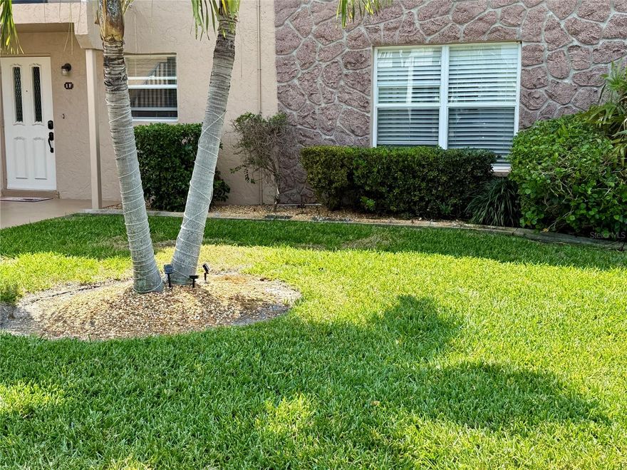 Own Your Piece of Paradise! Perfect for a winter get away or year round. Move right in because it is being sold Turn Key. All furniture and non personal items stay. Large Lanai with easy access to the pool with no stairs. This first floor unit is an end unit to add more privacy. The "Mermaid Condominium" has a great location on a gulf access canal and walking distance to town. Many upgrades including the kitchen, electric and flooring. Large bedrooms with plenty of closet space. There is also a bonus room (5.5'X8') which can be a storage room, work shop or small office. The Lanai stretches almost the width of the unit with all tile floors, removable widows and perfect for eating, relaxing and entertainment. The Kitchen was updated with granite countertops, wood cabinets, stainless steel appliances and a pantry. The living room and dining room opens up to the lanai. The hallway leads to another pantry, linen closets, Laundry closet, Full Bath, bonus room and both Bedrooms for more privacy. You have a carport space and an outside storage closet close to your front door. The HOA has a new roof and plenty of reserves. Don't let this one get away!