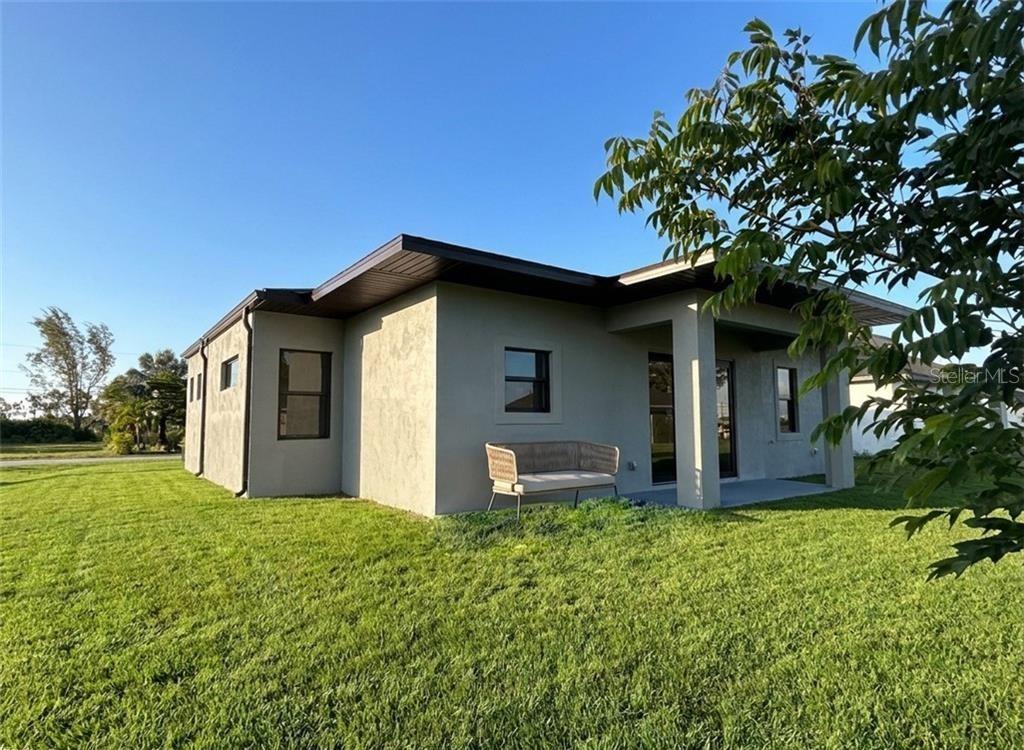 Photo of 2418 NW 25th Street, Cape Coral, FL 33993 (MLS # O6440557)