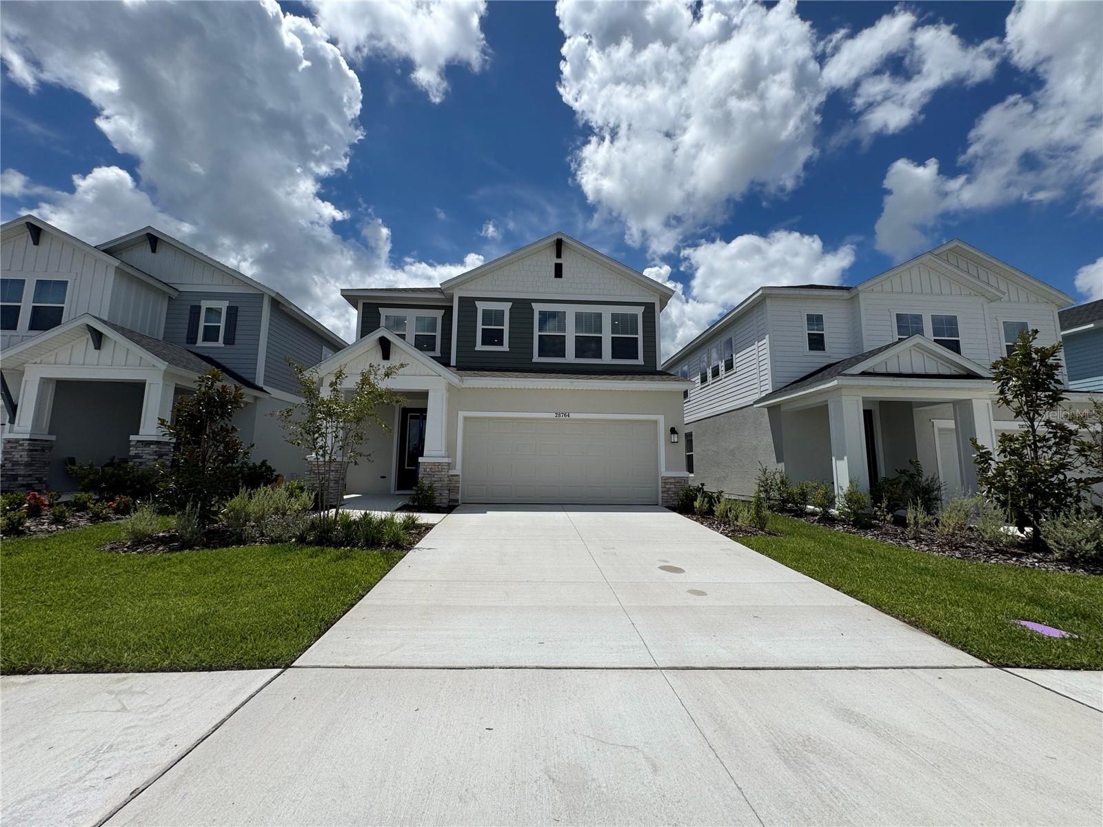 Be the first to call this stunning New Construction David Weekley 5-bedroom, 4-bathroom two-story home your own, beautifully nestled in the highly sought-after Persimmon Park, Wesley Chapel’s newest luxury community. This north-facing home is thoughtfully designed with the convenience of a first-floor master suite with a stunning bathroom plus a guest bedroom and full bathroom, making it perfect for comfort and accessibility. Enjoy peaceful moments with a gorgeous conservation view, while being just minutes from top-rated schools, hospitals, shopping, dining, sports facilities, and major highways—everything you need right at your doorstep.
Property Highlights:
First Floor:
Expansive open floor plan featuring soaring ceilings and abundant natural light pouring in through tall windows
Gourmet designer kitchen with quartz countertops, a large center island, built-in ovens, built-in microwave, modern electric cooktop, designer vent hood, and a dedicated food prep area
Brand new, high-end stainless steel appliances including an LG 4-door French refrigerator, and large-capacity washer & dryer
Formal dining room ideal for hosting memorable gatherings
Cozy living room offering serene conservation views, perfect for relaxation
Master suite with conservation views and elegant laminate flooring, plus a spa-inspired en suite bath with an XL walk-in shower and oversized walk-in closet
Additional guest bedroom or office with adjacent full bathroom featuring quartz countertops, designer tile, and recessed lighting
Epoxy flooring in the garage for a clean, durable finish
Covered lanai providing a tranquil outdoor space for unwinding
Second Floor:
Spacious loft area filled with abundant natural light from numerous large windows, creating a bright and inviting space perfect for family gatherings or entertainment; the entire second floor is carpeted
One generously sized bedroom with a private en suite bathroom featuring a tub finished with quartz countertops, designer tile, and recessed lighting
Two additional large bedrooms with large closets
An additional guest bathroom with a tub finished with quartz countertops, designer tile, and recessed lighting
Community Amenities:
Pool & cabana
Dog park
Playground
Interconnected trail system with access to Pasco Sports Complex
Location
Convenient access to I-75 & I-275 to Tampa, St Pete, Sarasota
30 minutes to Tampa International Airport
Minutes away from 3 major Hospitals Advent Care Hospital, Bay Care Hospital and the newly constructed Florida Medical Clinic Orlando Health Wiregrass Ranch Hospital
Close to shopping & dining at The Shops at Wiregrass, Tampa premium Outlets, Costco, Sam's Club, Publix, Aldi, etc
Zoned for top-rated Pasco County Schools
Don't miss your chance to enjoy luxury Florida living in this exceptional new home in Wesley Chapel's Persimmon Park. Call today for your private viewing