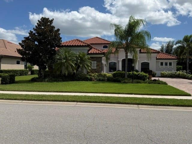 Photo of 5672 Cloverleaf Run, Lakewood Ranch, FL 34211 (MLS # A4706450)