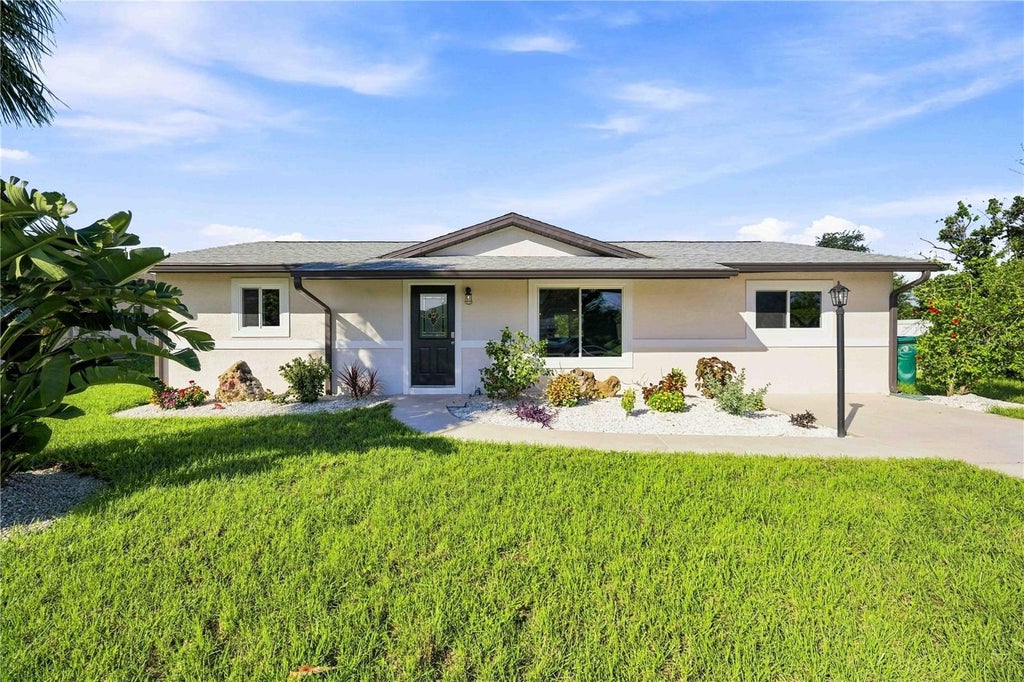 Photo of 7321 Bolten Lane, Port Charlotte, FL 33981 (MLS # A4702590)