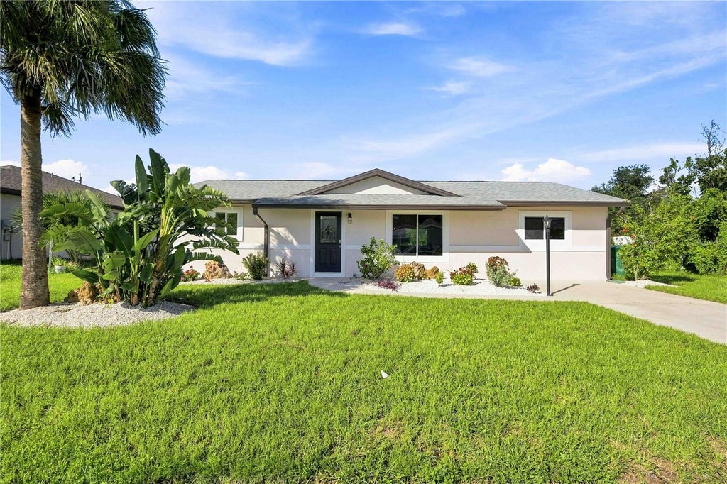 Photo of 7321 Bolten Lane, Port Charlotte, FL 33981 (MLS # A4702590)